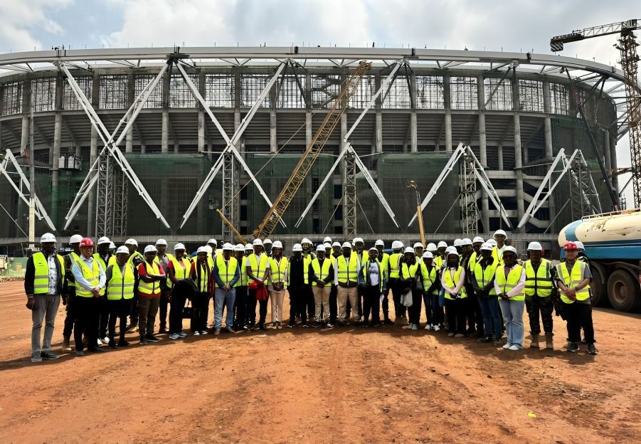 AAK delegates on a build tour site visit, in high-visibility vests and hard hats